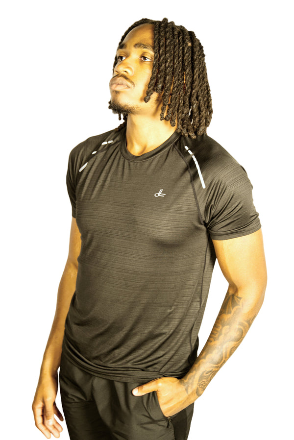 Man wearing a Black athletic shirt with  Kamili logo