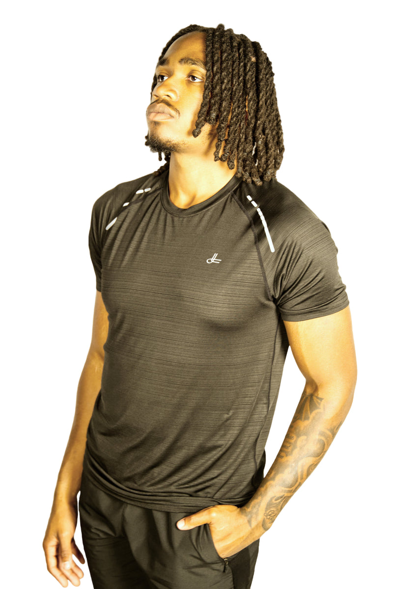 Man wearing a Black athletic shirt with  Kamili logo